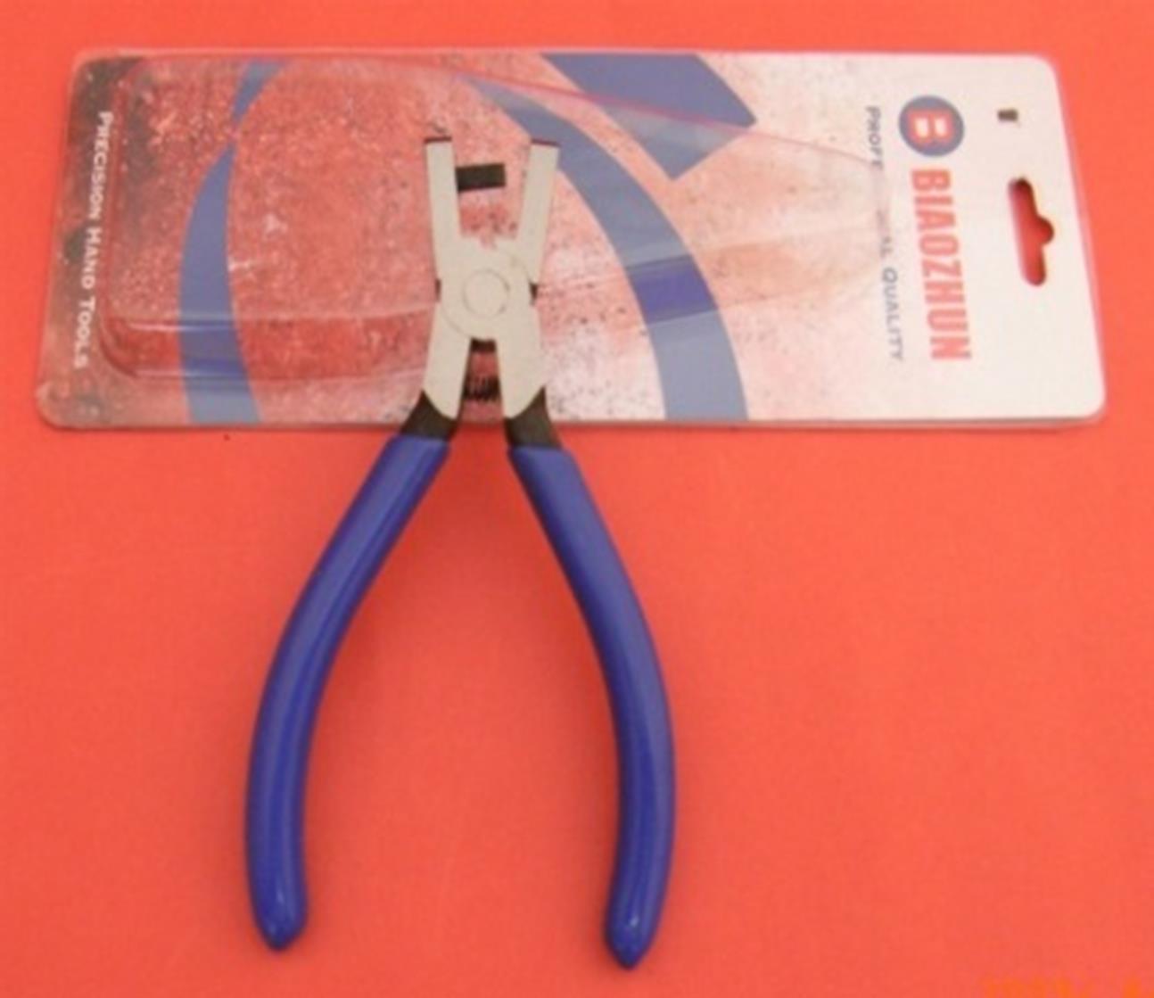 PLIER FOR PUNCHING RECTANGULAR HOLES